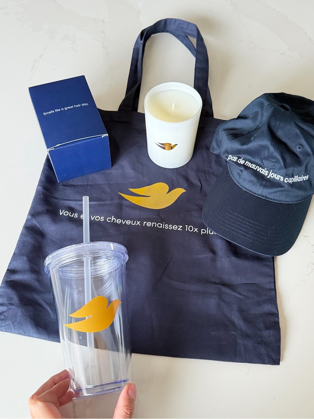 DOVE branded logo set: candle, cap, cup and tote bag